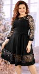Очаровательное черное коктейльное платье