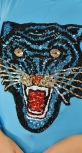 Голубая кофточка с тигром
